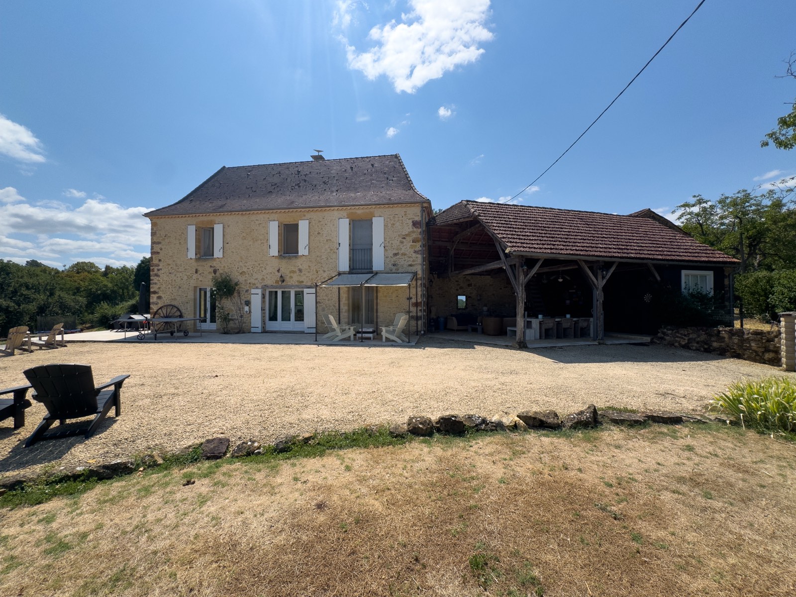 vakantiehuis Dordogne · Het huis met overdekte veranda
